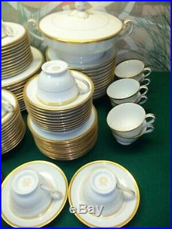 79 PIECE SET OF NORITAKE CHINA WHITE WithGOLD TRIM HAS M IN A WREATH LOGO